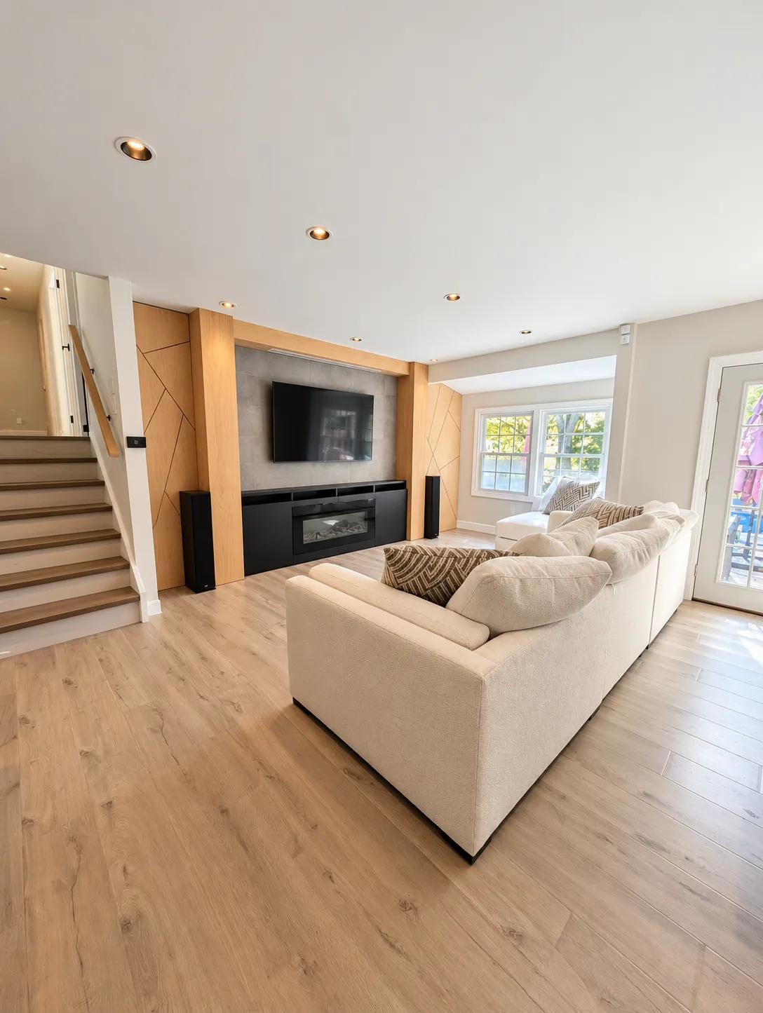 Living room with custom millwork and media wall